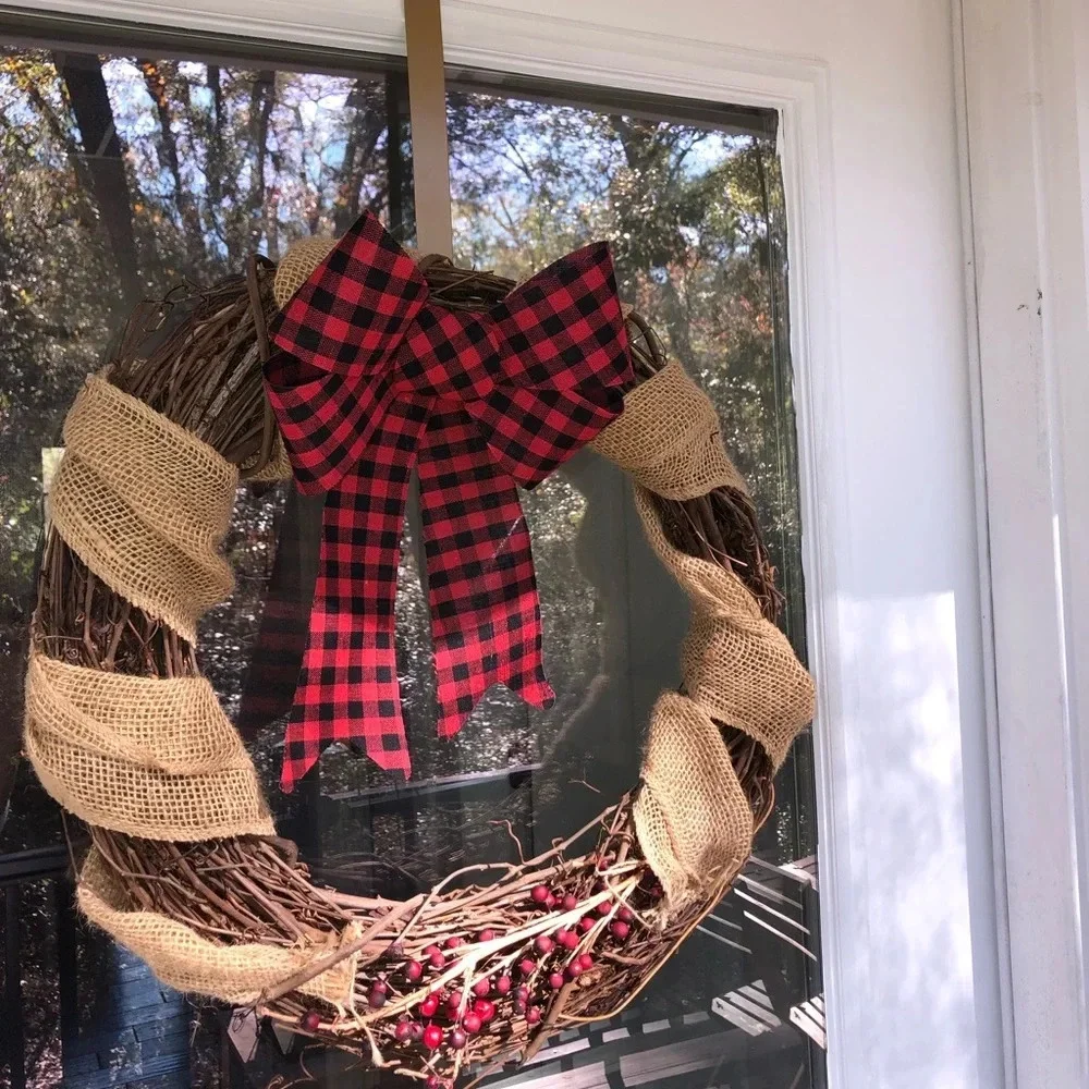 Handmade decorated Christmas wreath with door hanger